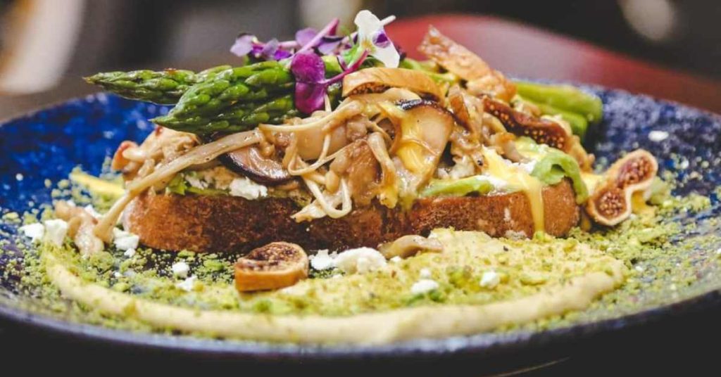 Avocado , wild mushroom and asparagus on toast 